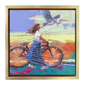 framed oil painting of woman with bicycle and great blue heron