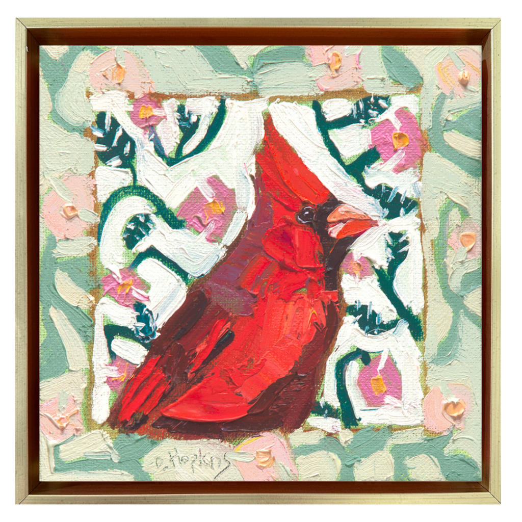 Original oil painting of a bright red male cardinal in profile surrounded by pink flowers and sage-green decorative patterns by Denise Hopkins.